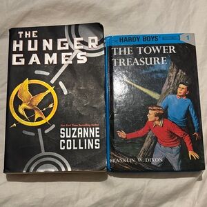 The Hunger Games paper back  and The Hardy Boys book hard cover